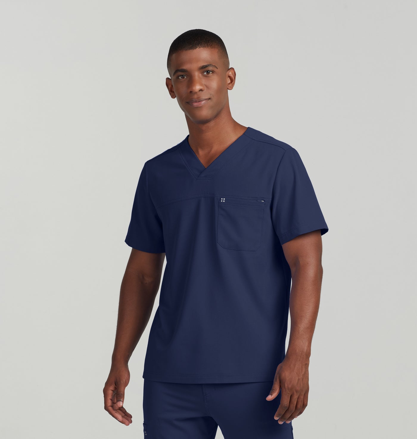 WT131 - CRFT Men's 2-Pocket V-neck Scrub Top