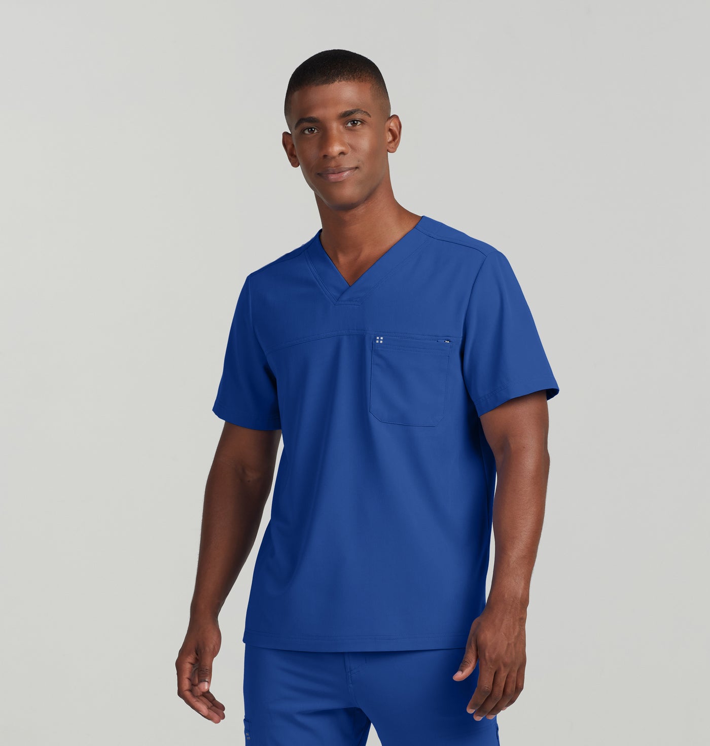 WT131 - CRFT Men's 2-Pocket V-neck Scrub Top