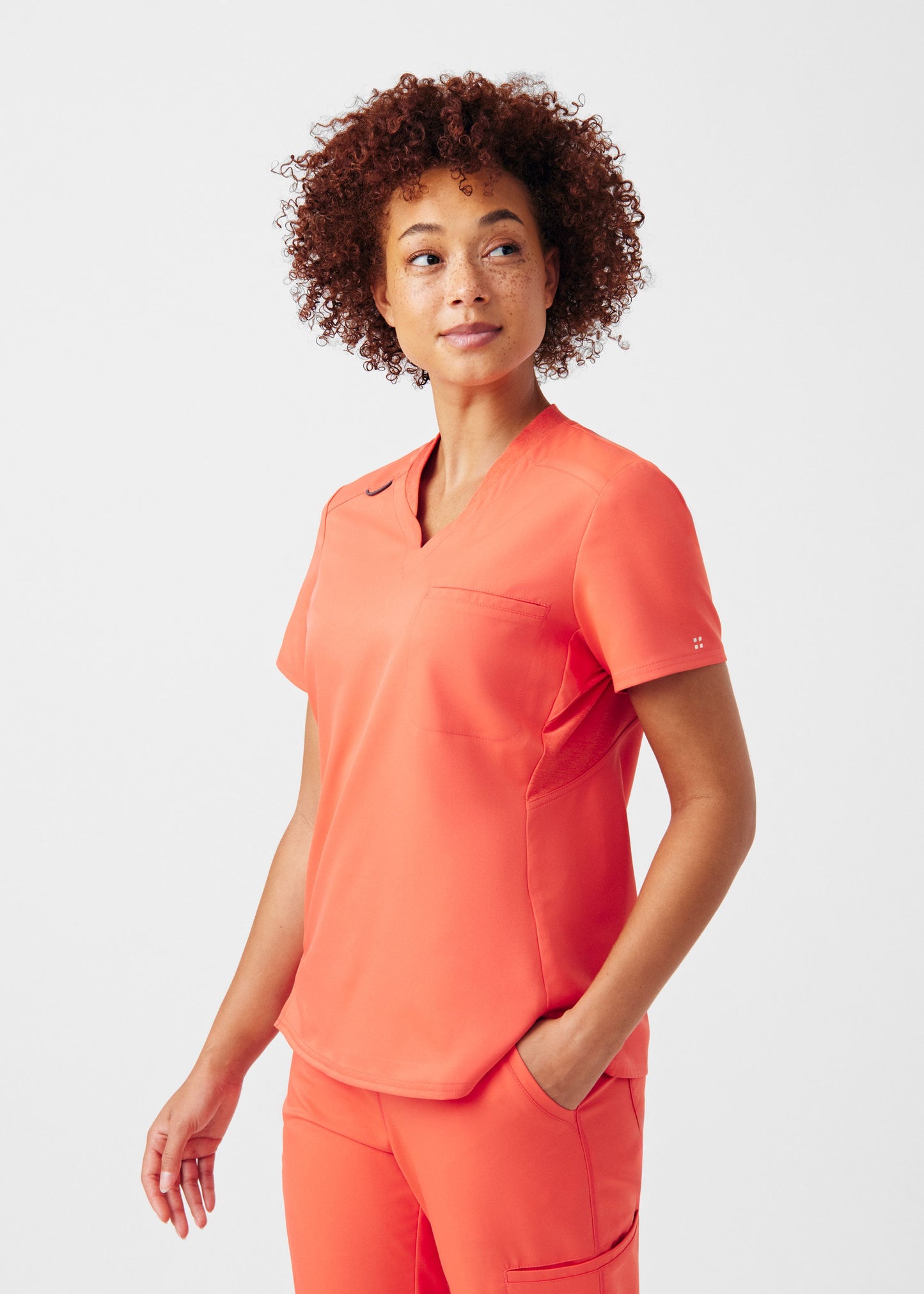 WT119 - VIBE 2-Pocket V-Neck Scrub Top